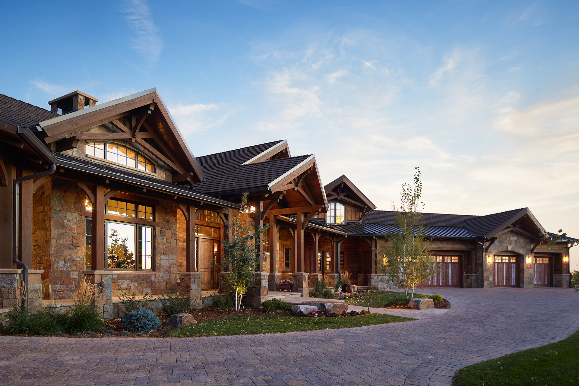 Strategies Used: Heavy timber and stone for exterior materials; Standing seam metal roof and asphalt shingles